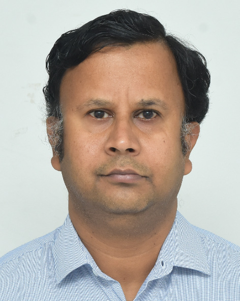 Vishal Biyani in a light blue checked shirt